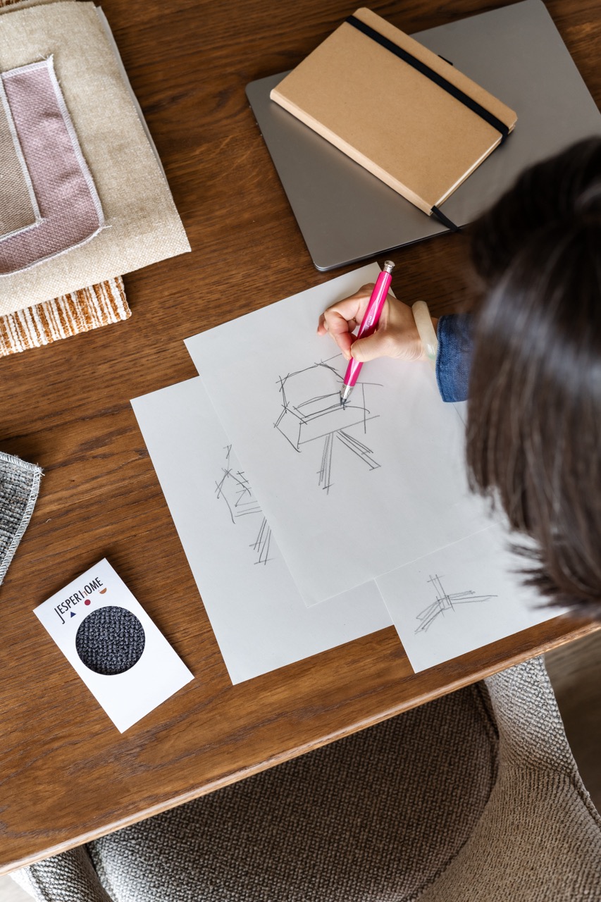 Designer sketching chair concept